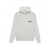 The Light Oatmeal Essentials Hoodie is crafted from soft fleece fabric, featuring a hooded collar and rib-knitted cuffs for a comfortable and cozy fit. Its versatile light oatmeal color and pullover design make it perfect for casual wear, layering, or lounging at home in style.