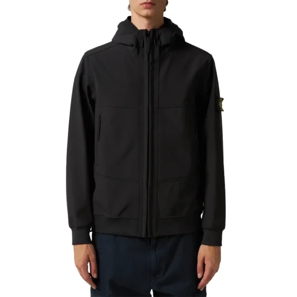 The Stone Island Light Soft Shell Black Jacket is made from durable polyester, featuring a hooded collar and ribbed knit cuffs for a comfortable and secure fit. With a front zip closure and sleek black design, this lightweight jacket is perfect for casual wear, outdoor activities, or layering in cooler weather, combining style and functionality effortlessly.